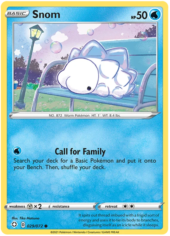 Snom common kaart 029/072 uit de Pokémon Shining Fates set op een parkbankje
