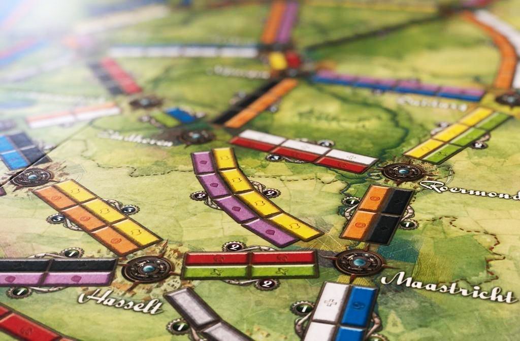 Ticket to Ride Nederland uitbreiding bordspel met plattegrond, bruggen en toltokens