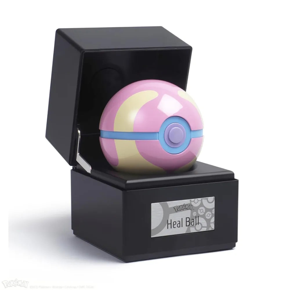 The Wand Company Pokémon Heal Ball Replica in metalen displaybox met verlichting - vooraanzicht