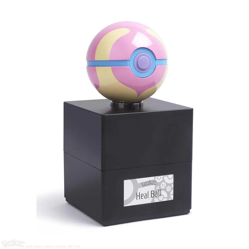 The Wand Company Pokémon Heal Ball Replica in metalen displaybox met verlichting - achteraanzicht