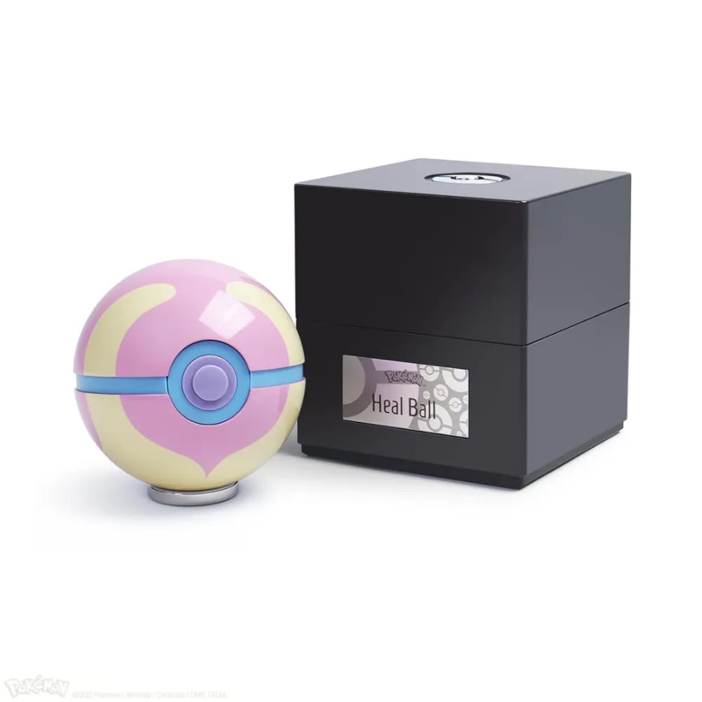 The Wand Company Pokémon Heal Ball Replica in metalen displaybox met verlichting - vooraanzicht